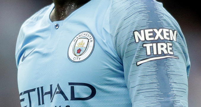 Nexen logo" or "Manchester City football club with Nexen as a sponsor