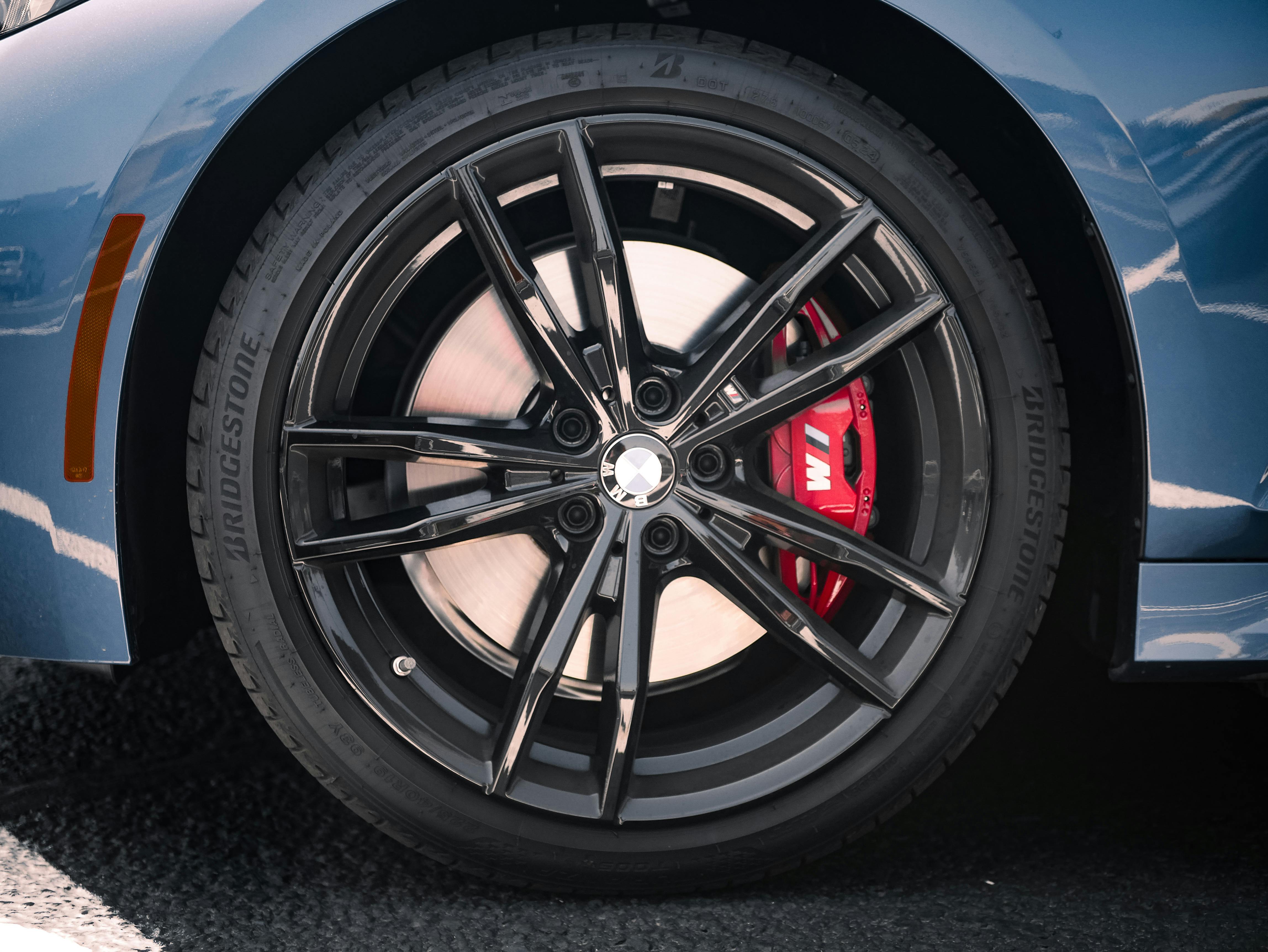 A close-up shot of a Bridgestone tyre on a BMW rim