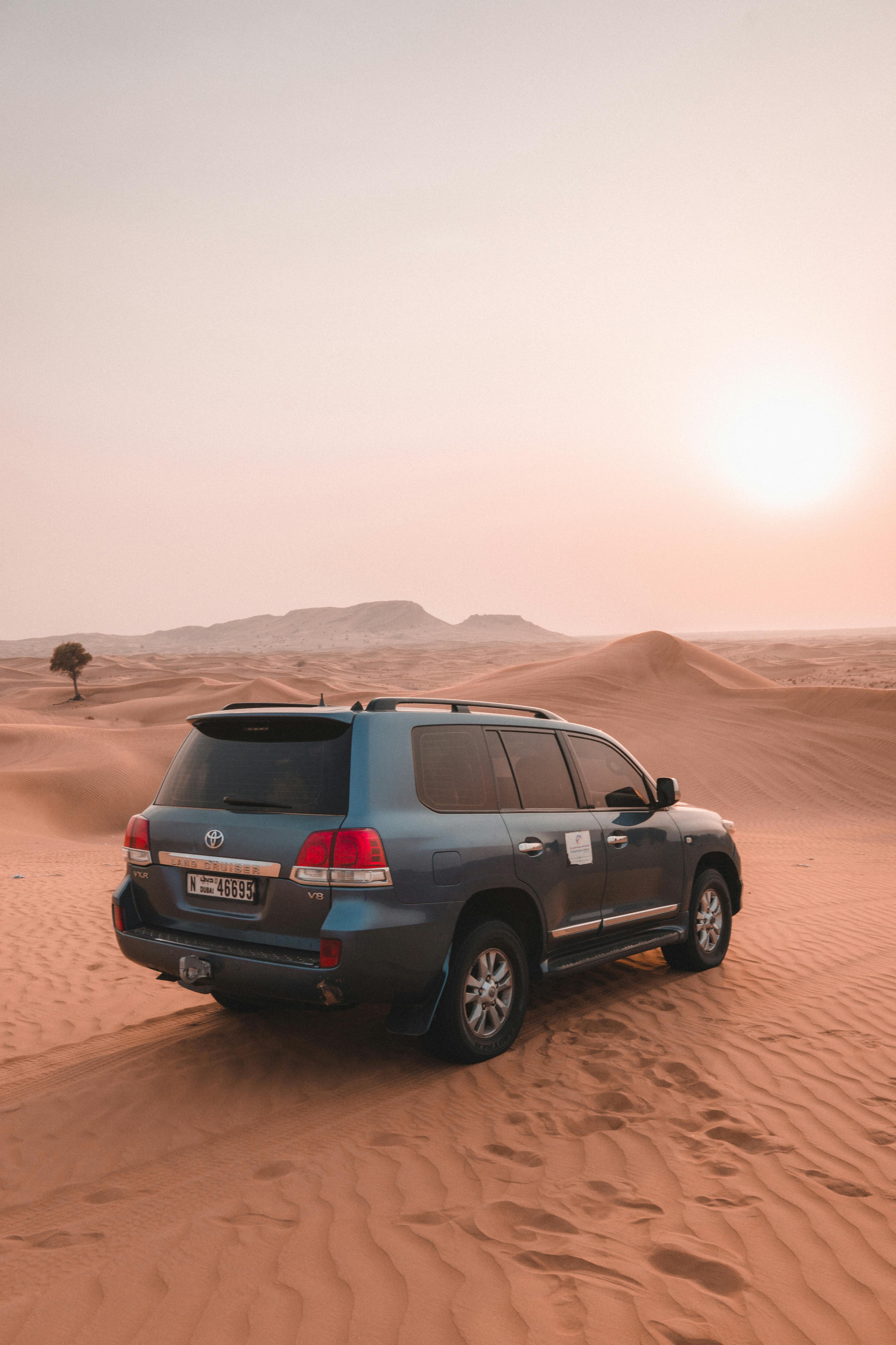A landcruiser cruising through UAE desert