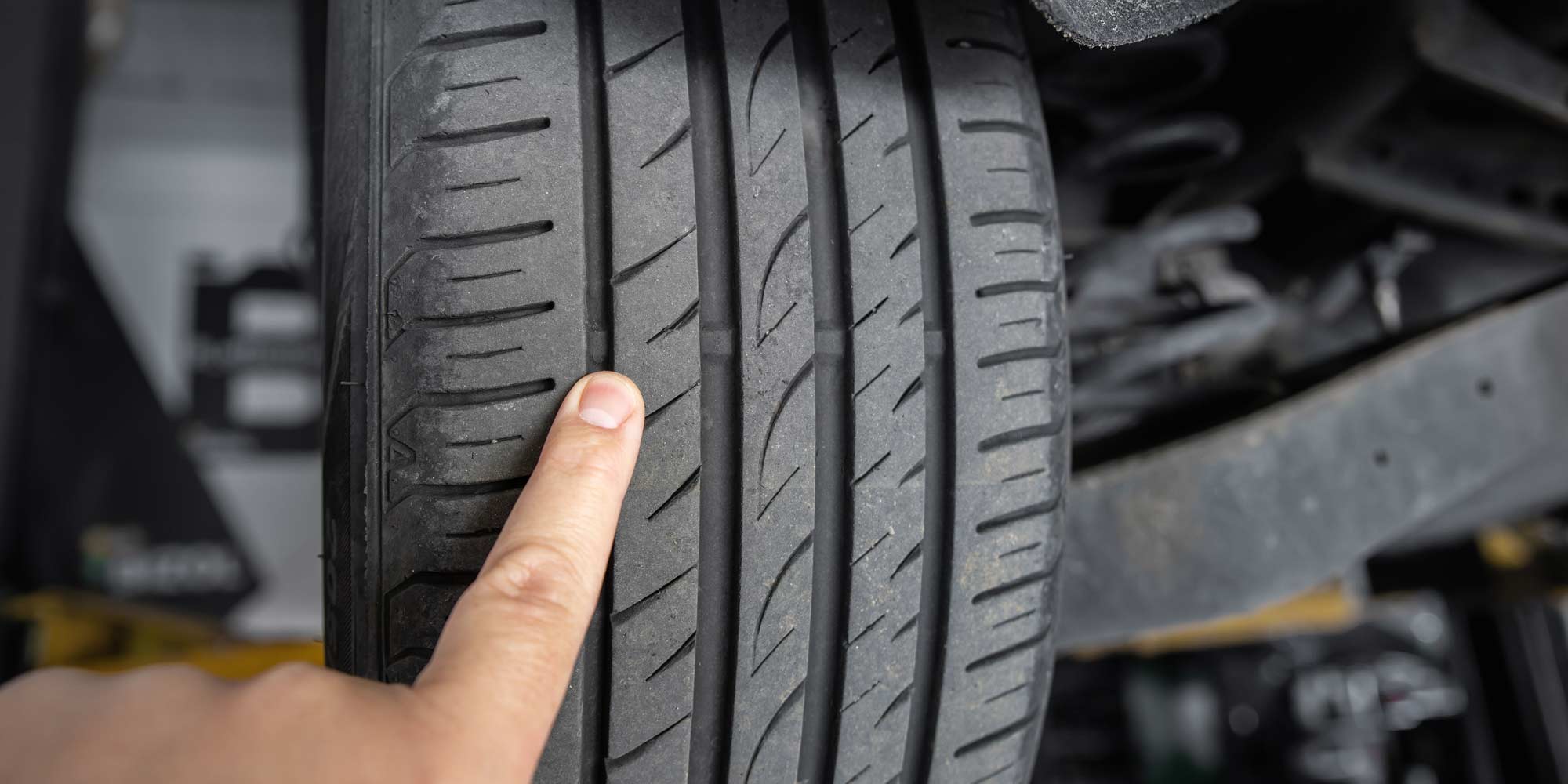 Finger pointing to tread